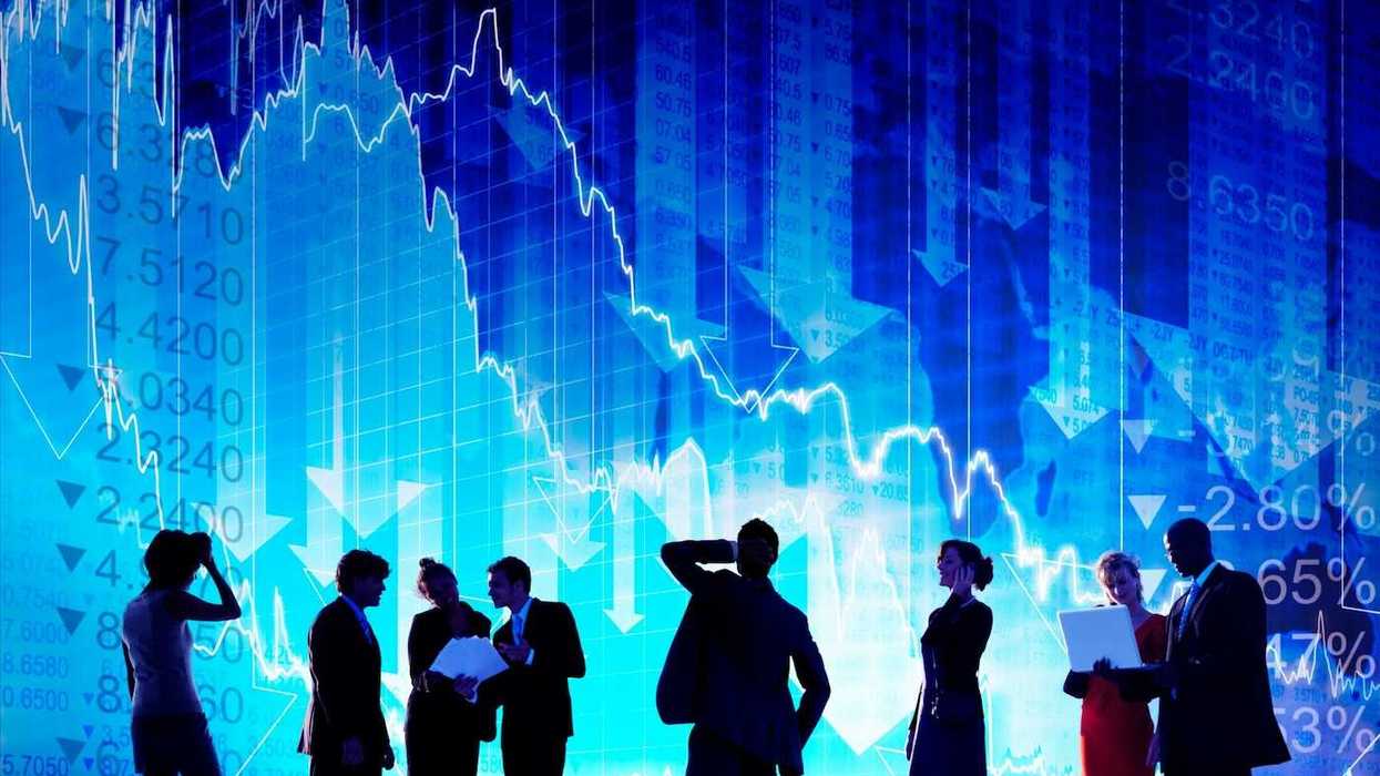 3D rendering of financial professionals reacting to looming background of a falling stock market indicators.