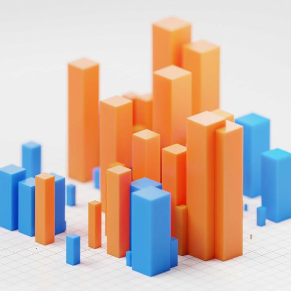 A 3D illustration of a bar chart with orange and blue bars