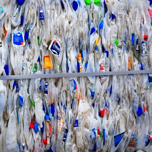 A bale of used plastic packaging