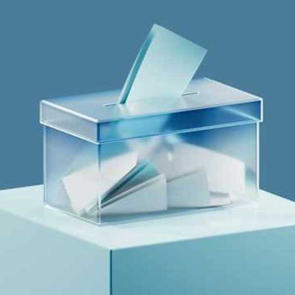 A ballot box with ballots in it against a blue background