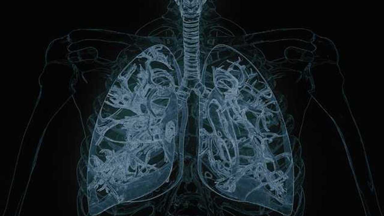 A black background with an illustration of human lungs in white ink