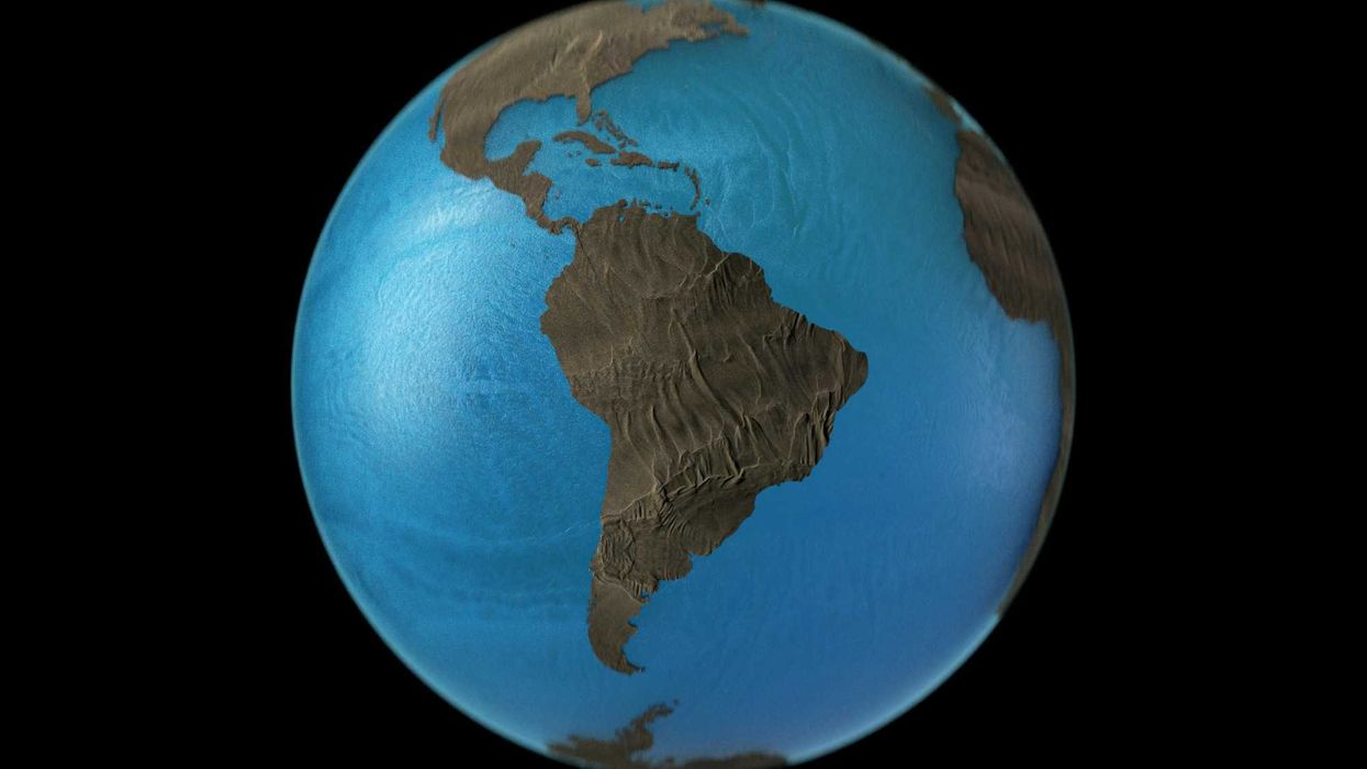 a blue and brown earth globe on a black background.