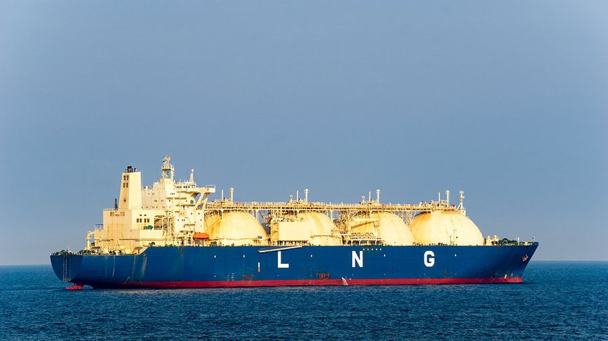 A blue and white ship at sea with LNG written on the side of it.