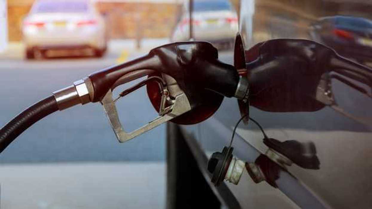 A car being filled with gas