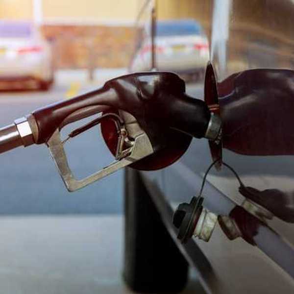 A car being filled with gas