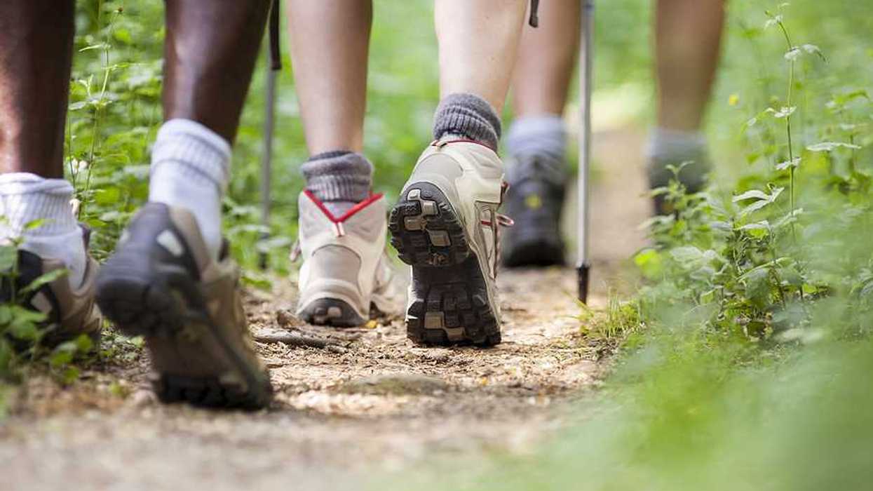 A closeup of hikers' feet on a trail