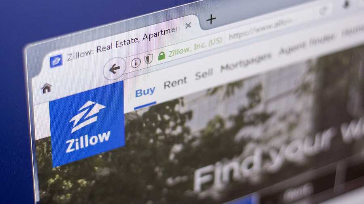 A closeup of the Zillow logo on a website