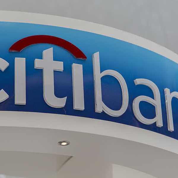 A closeup view of a citibank sign in red, white and blue