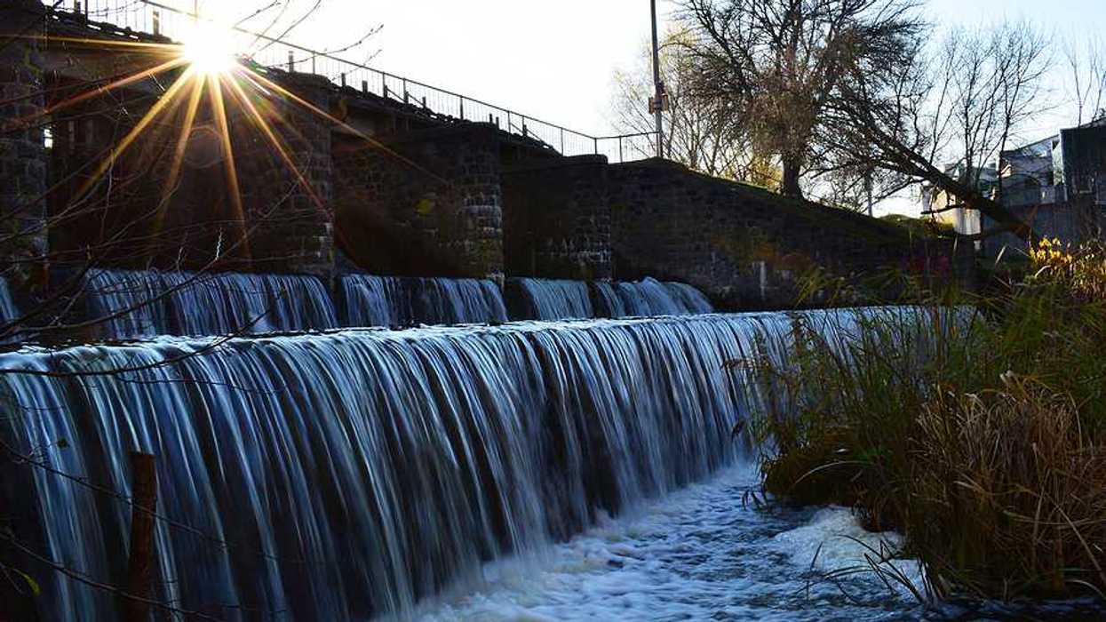 A dam allowing water to flow