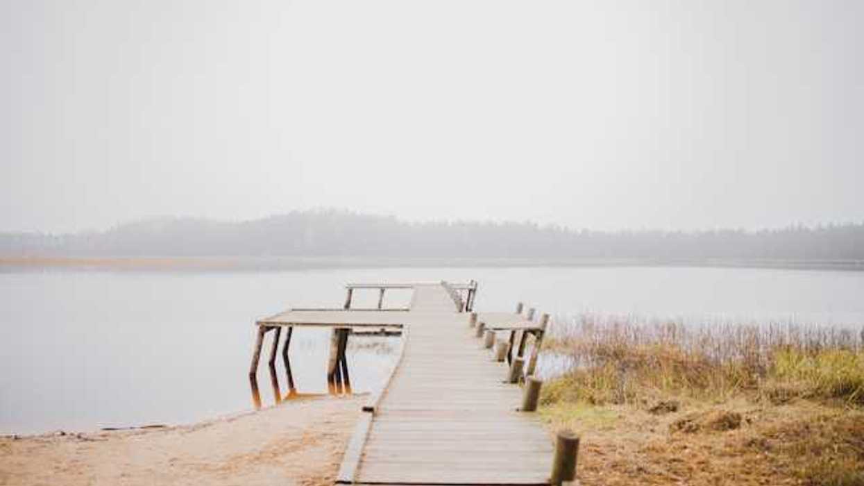 A dock stretching into a body of water