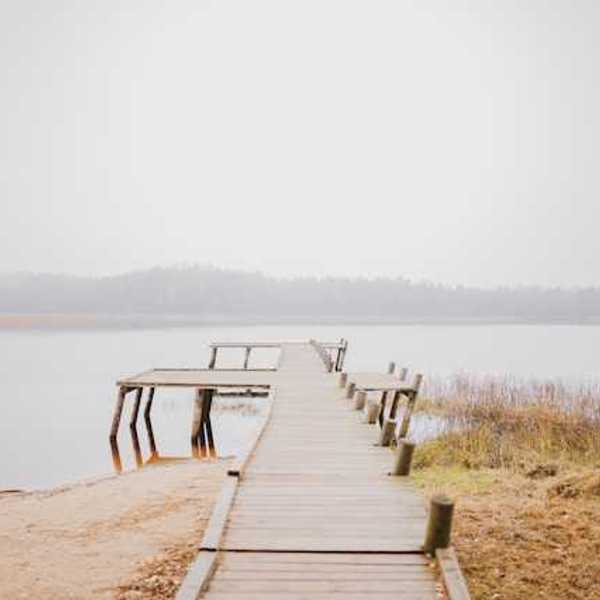 A dock stretching into a body of water