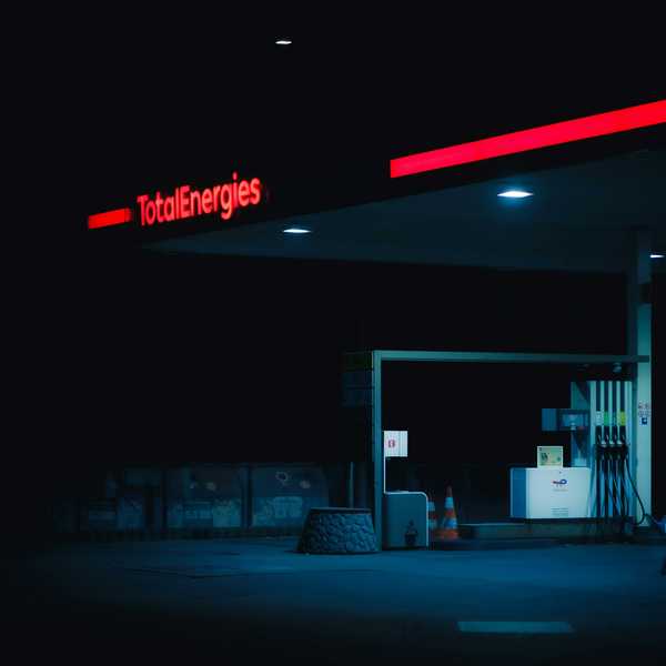 a gas station at night.