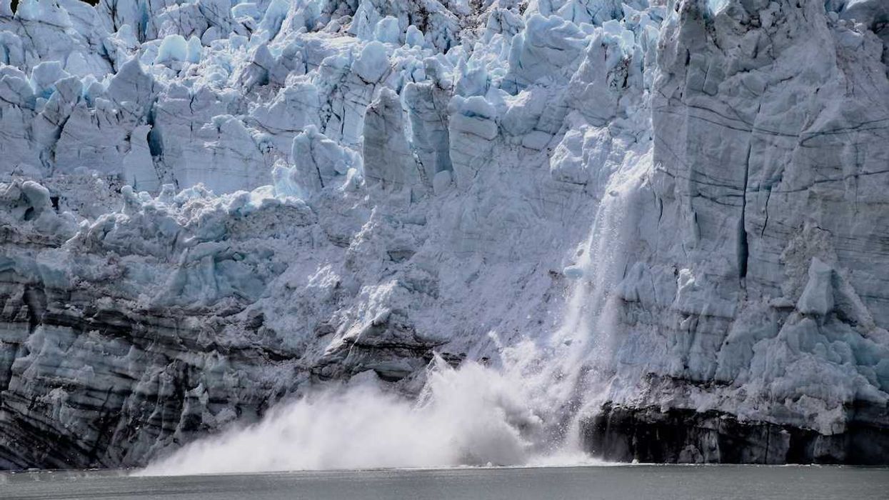 A glacier calving into sea