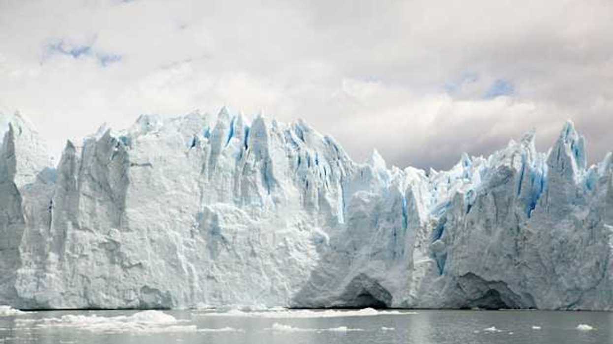 A glacier looming over a body of water
