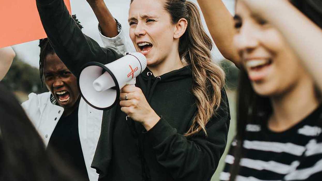A group of women protesting; anger over data centers is fueling a new political movement