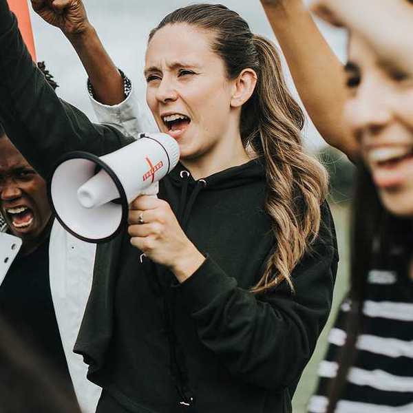 A group of women protesting; anger over data centers is fueling a new political movement