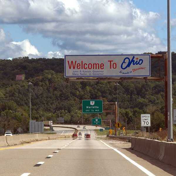 A highway with a sign saying Welcome to Ohio