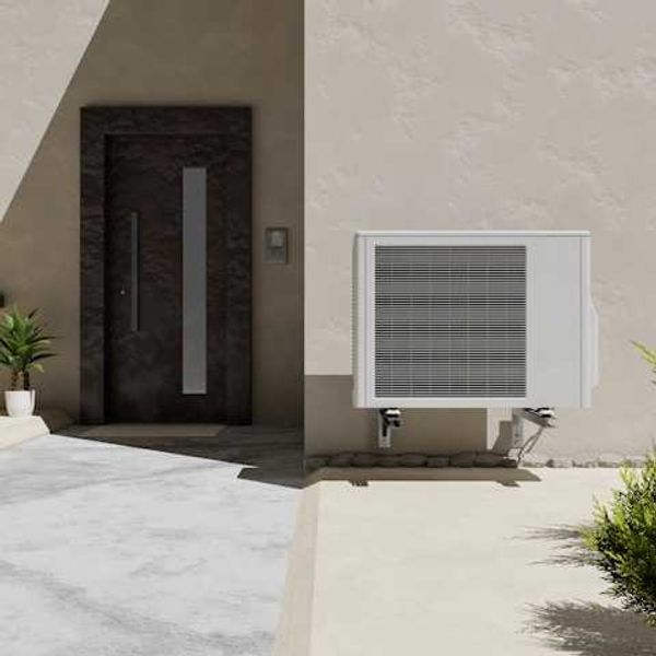 A house with a heat pump installed on the side of it