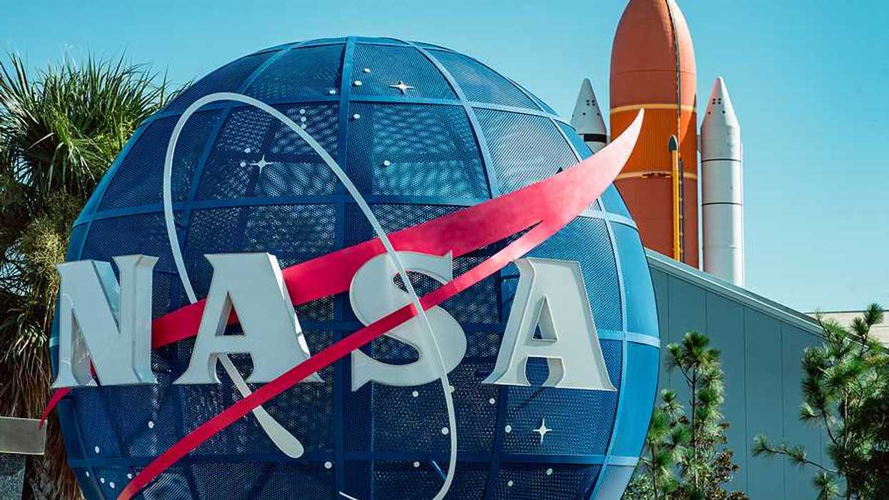 A large blue globe with the letters NASA on it