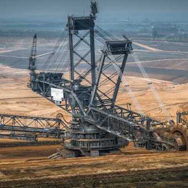 A large crane digging earth