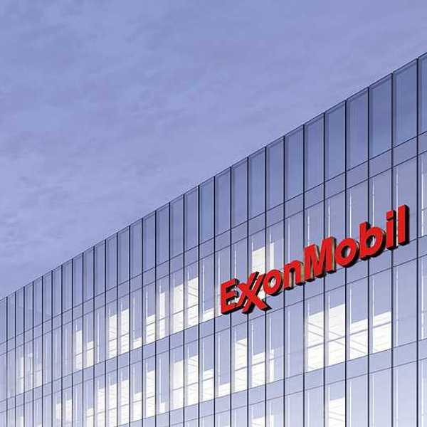 A large office building with the words ExxonMobil on the side