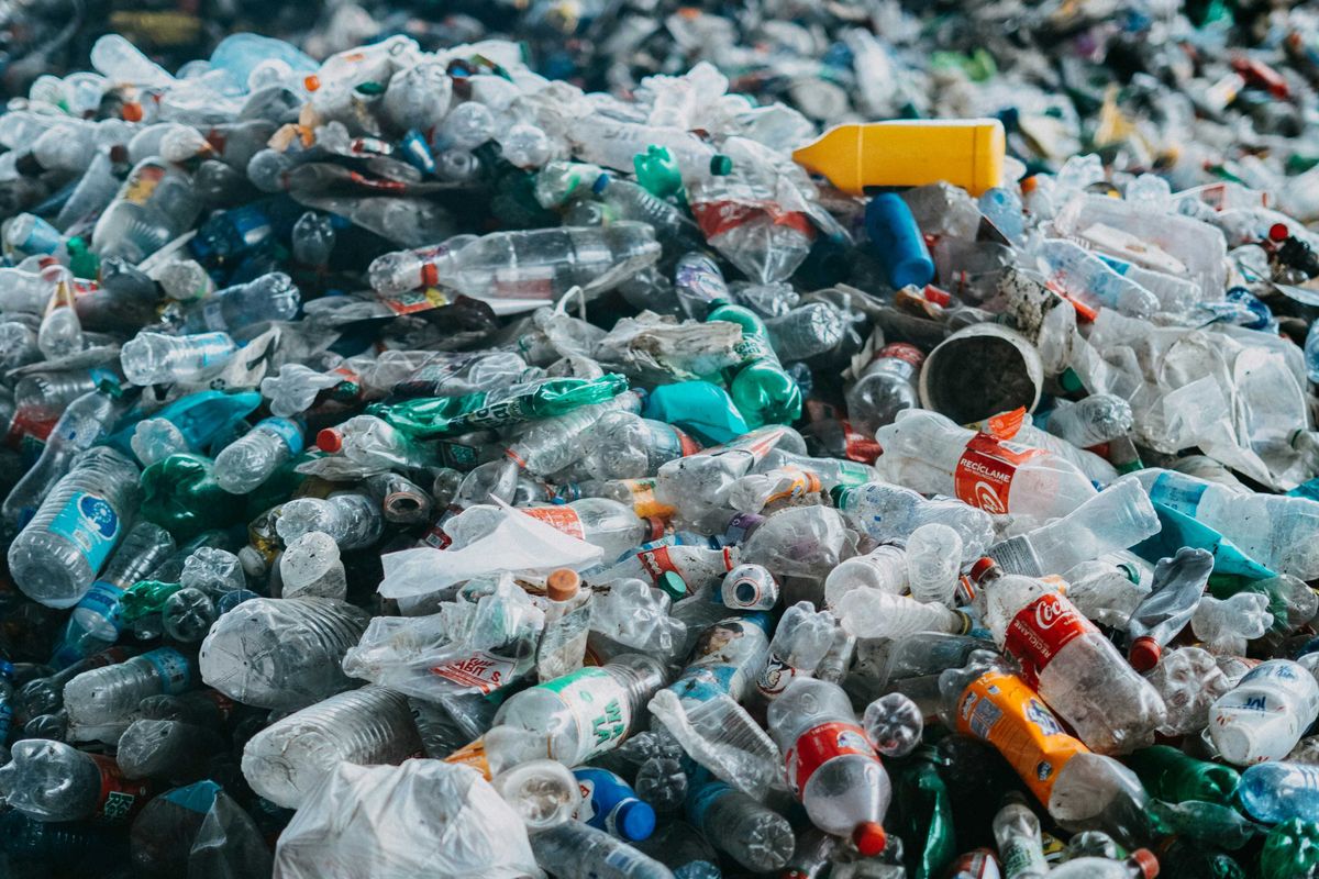 A large pile of plastic bottles