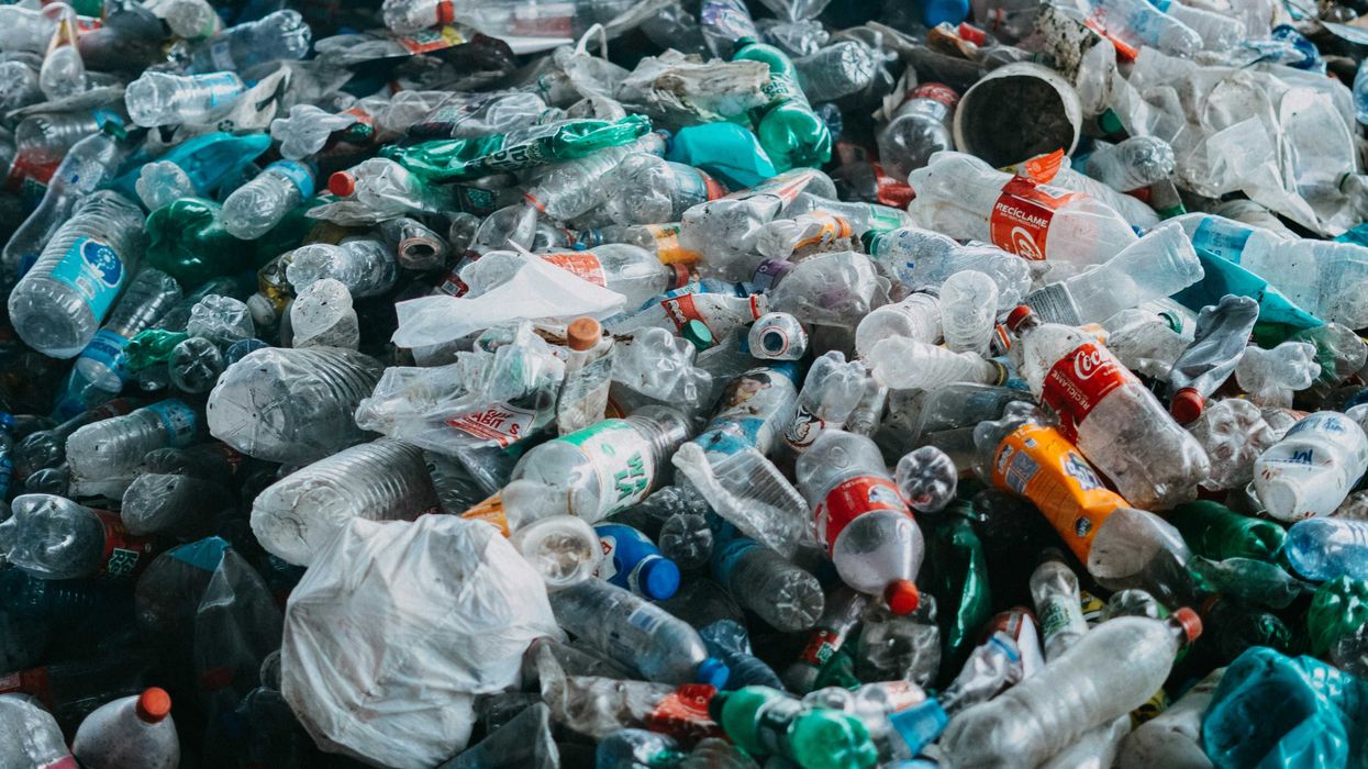 A large pile of plastic bottles
