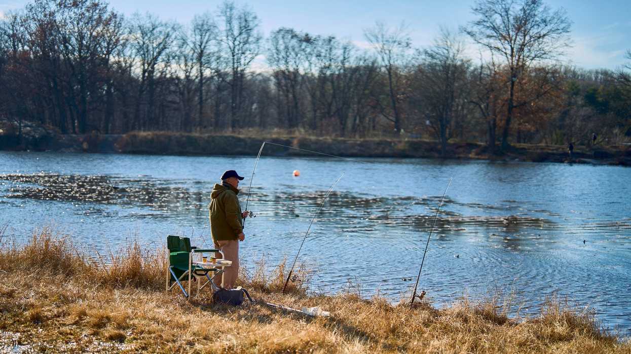 A man fishes in a lake