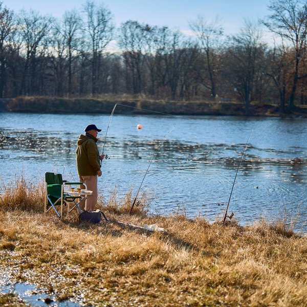 A man fishes in a lake