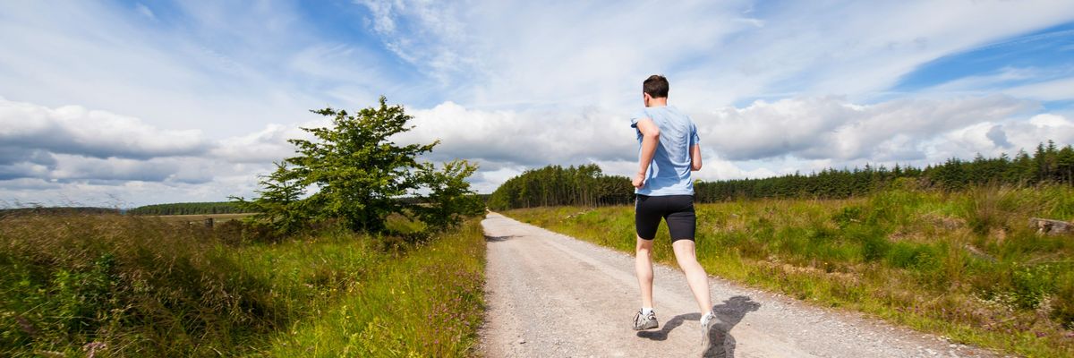 A man runs in a field