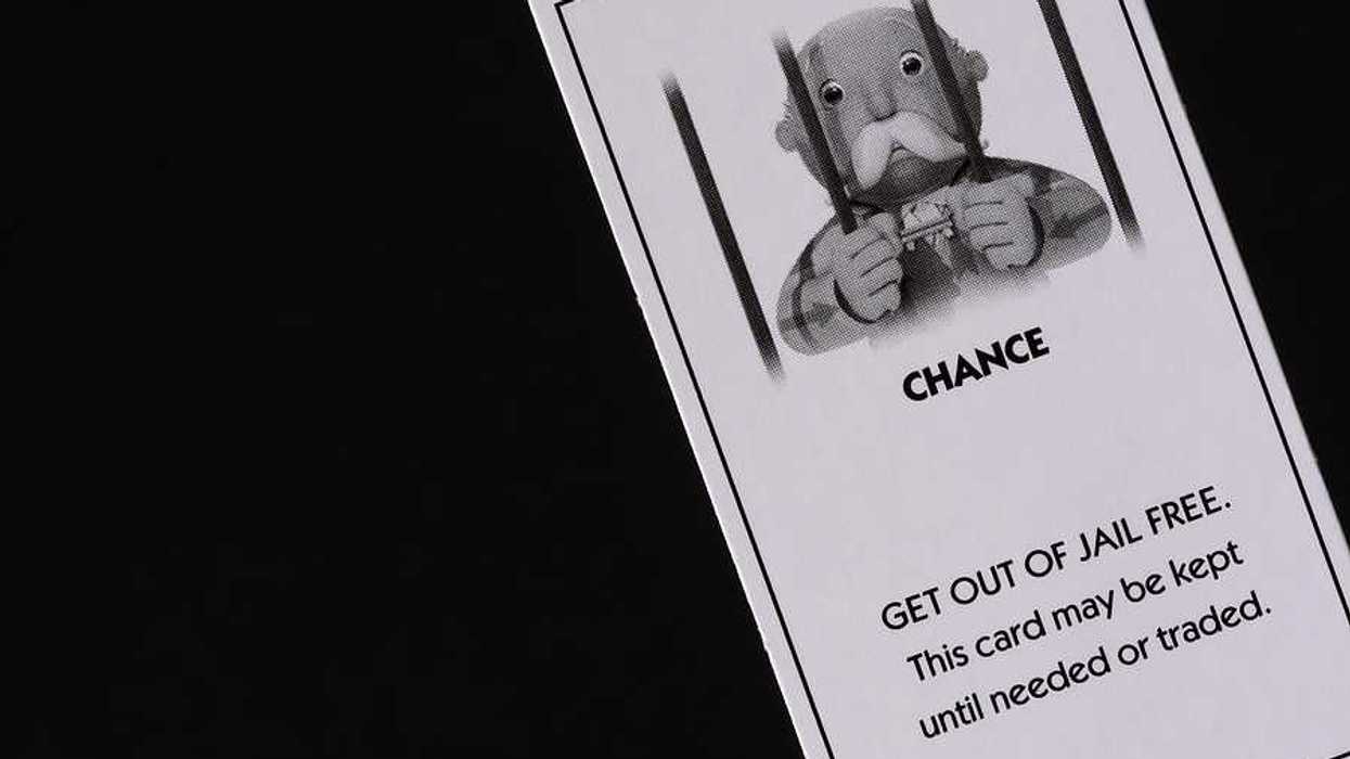 A Monopoly card that says CHANCE and Get out of jail free