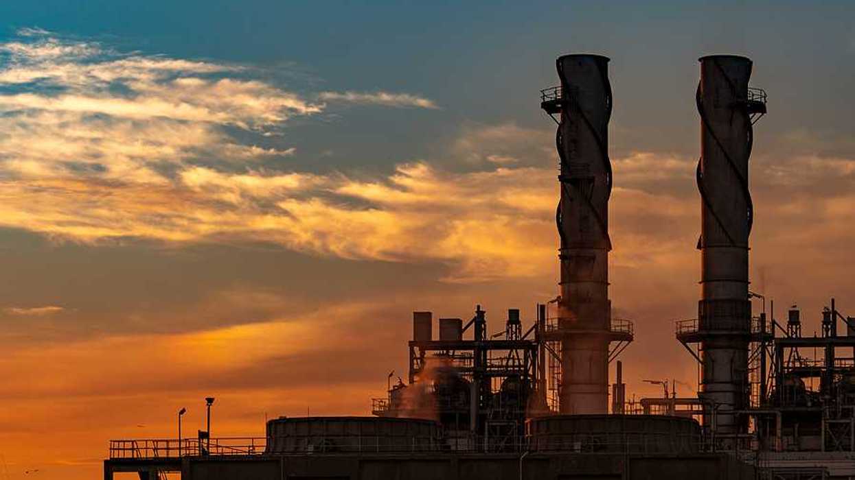 A natural gas power plant at sunset
