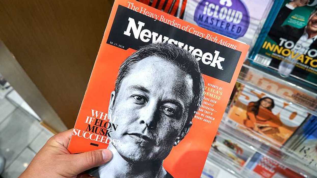 A Newsweek magazine with Elon Musk on the cover
