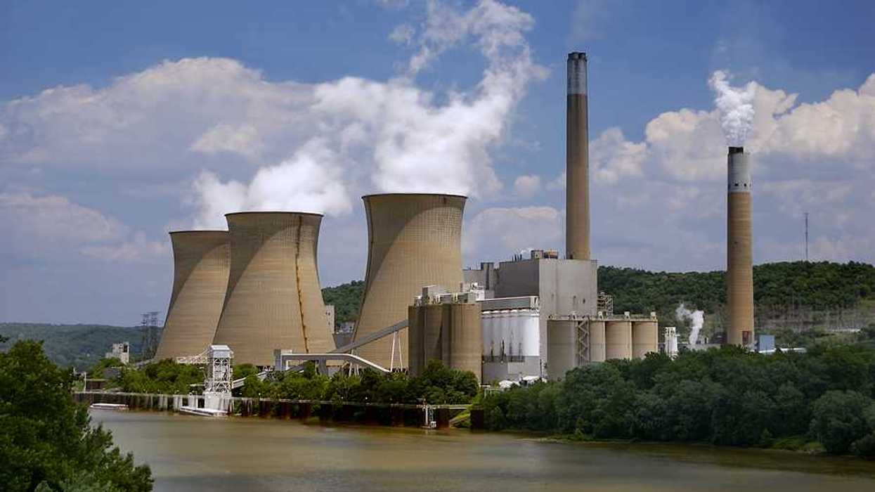 A nuclear power plant situated along a river.
