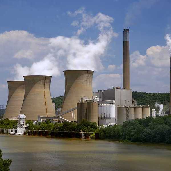 A nuclear power plant situated along a river.