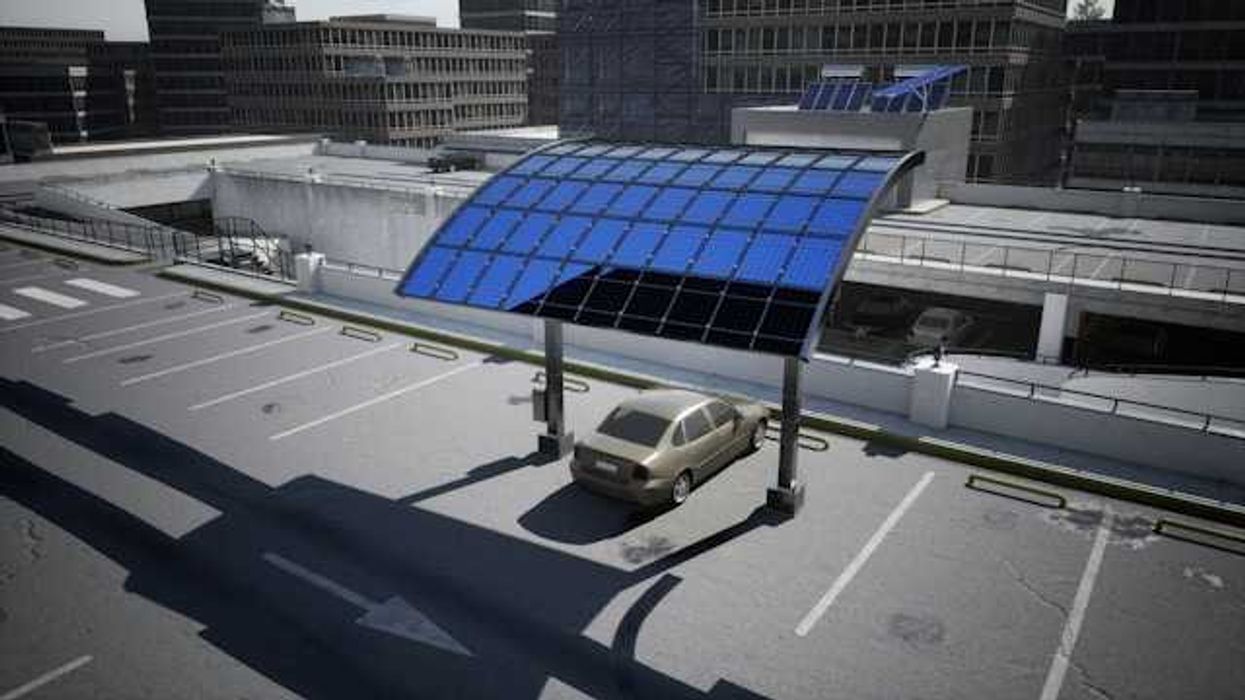 A parking lot with a solar panel serving as a canopy for a car