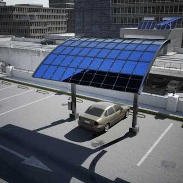 A parking lot with a solar panel serving as a canopy for a car