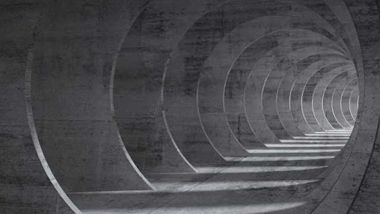 A pathway made from overlapping cement arches