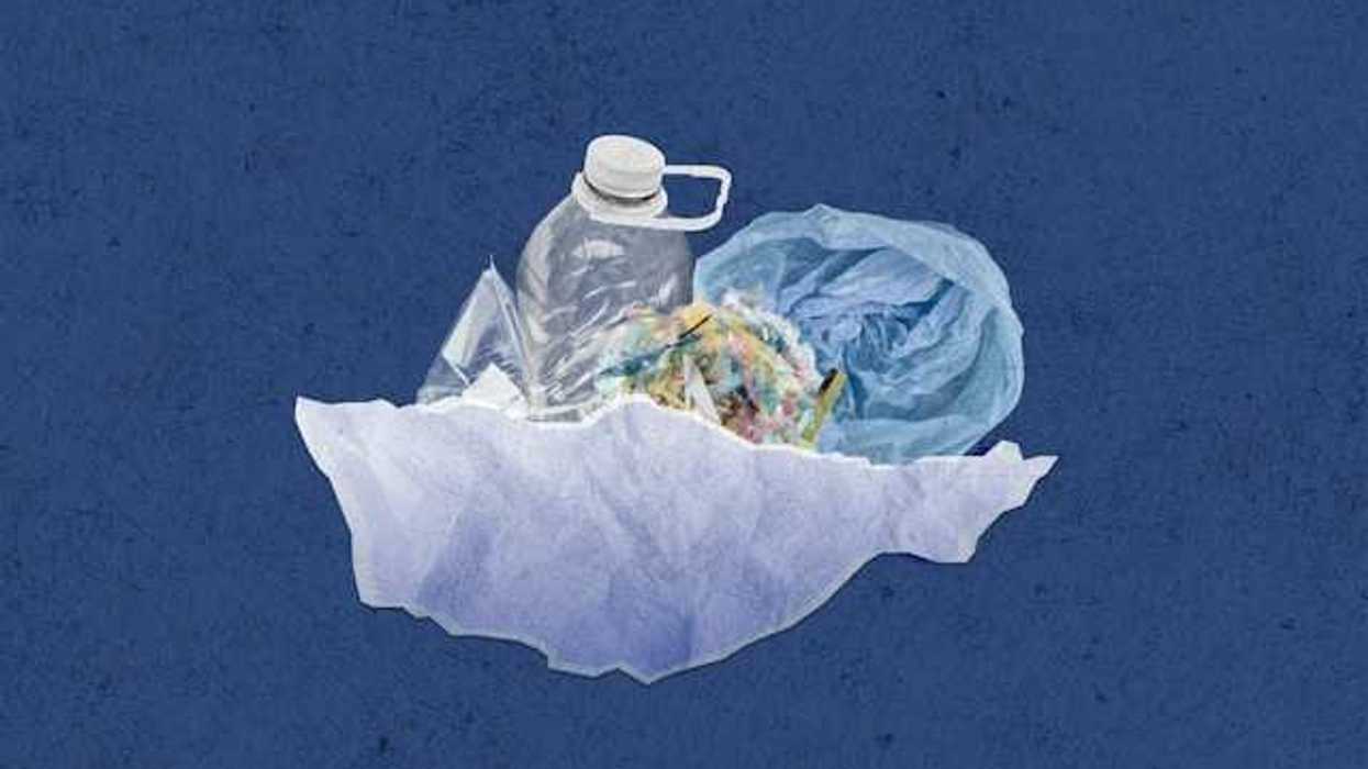 A pile of plastic trash on a blue background