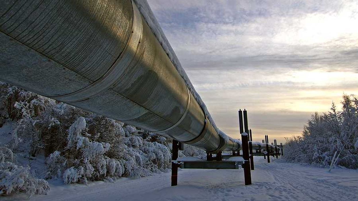 A pipeline stretching across a snowy landscape