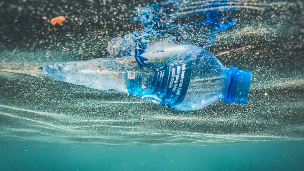a plastic bottle floating in the water