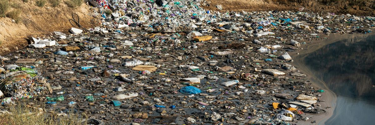 A river filled with plastic pollution.