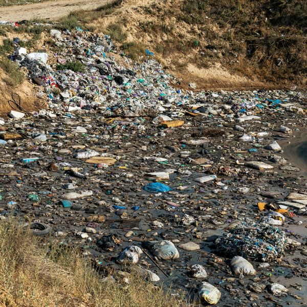 A river filled with plastic pollution.