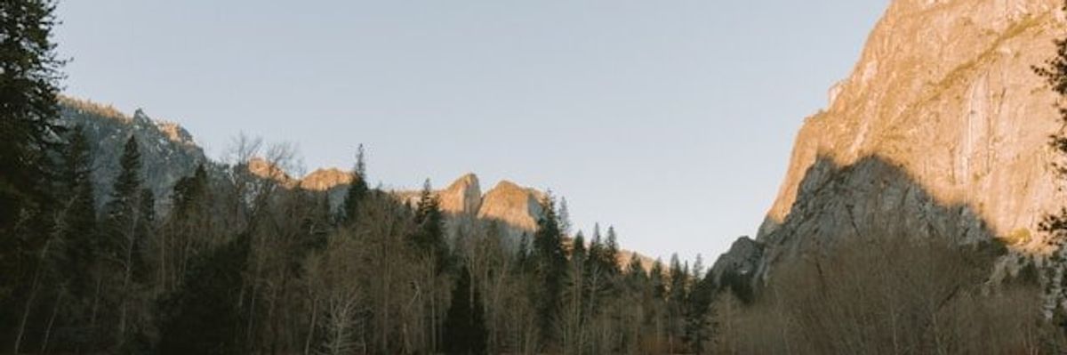 A river running between rocky hills.