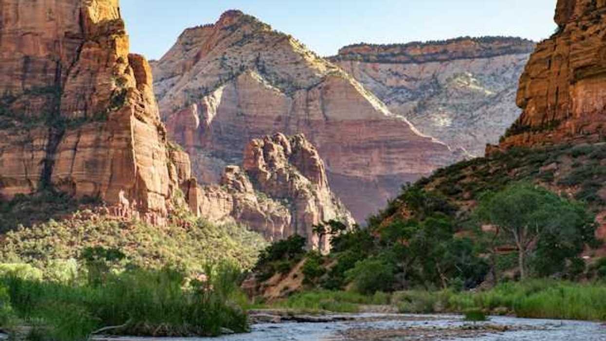 A river running through a lush green valley in the western U.S.