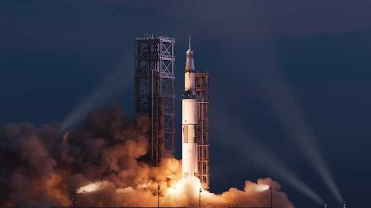 A rocket being launched into the night sky