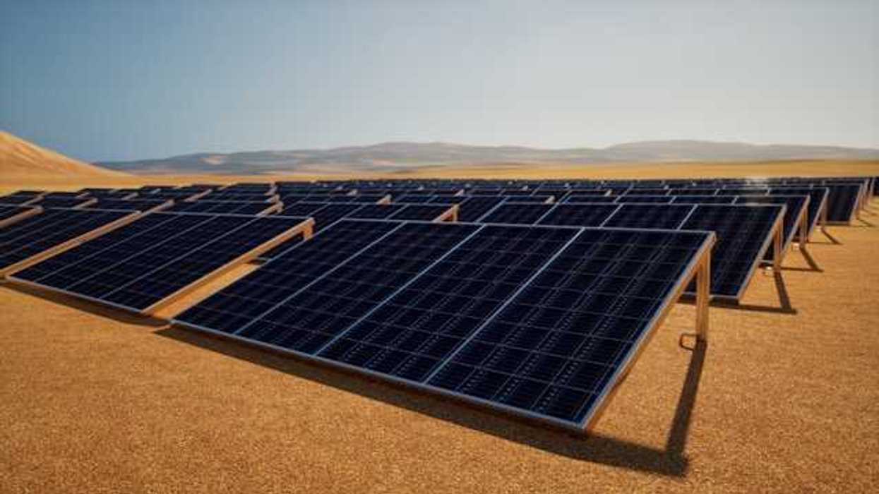 A row of solar panels in a desert environment