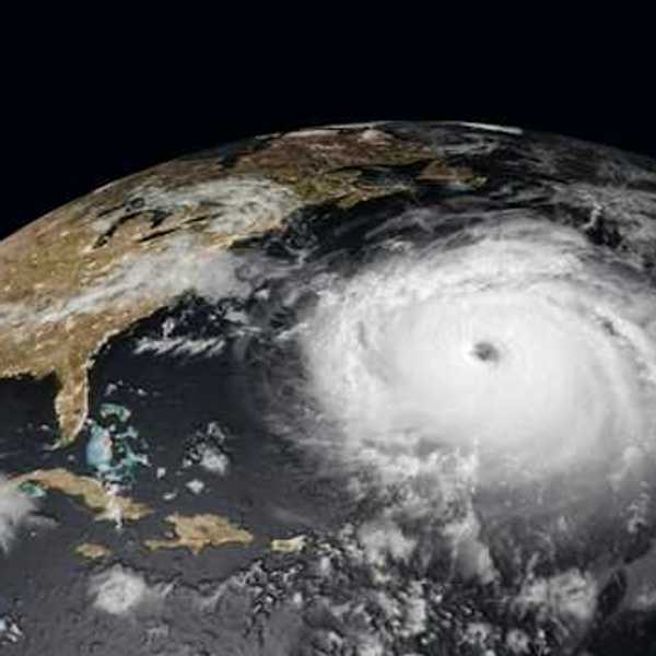 A satellite image of a hurricane approaching the east coast of the United States