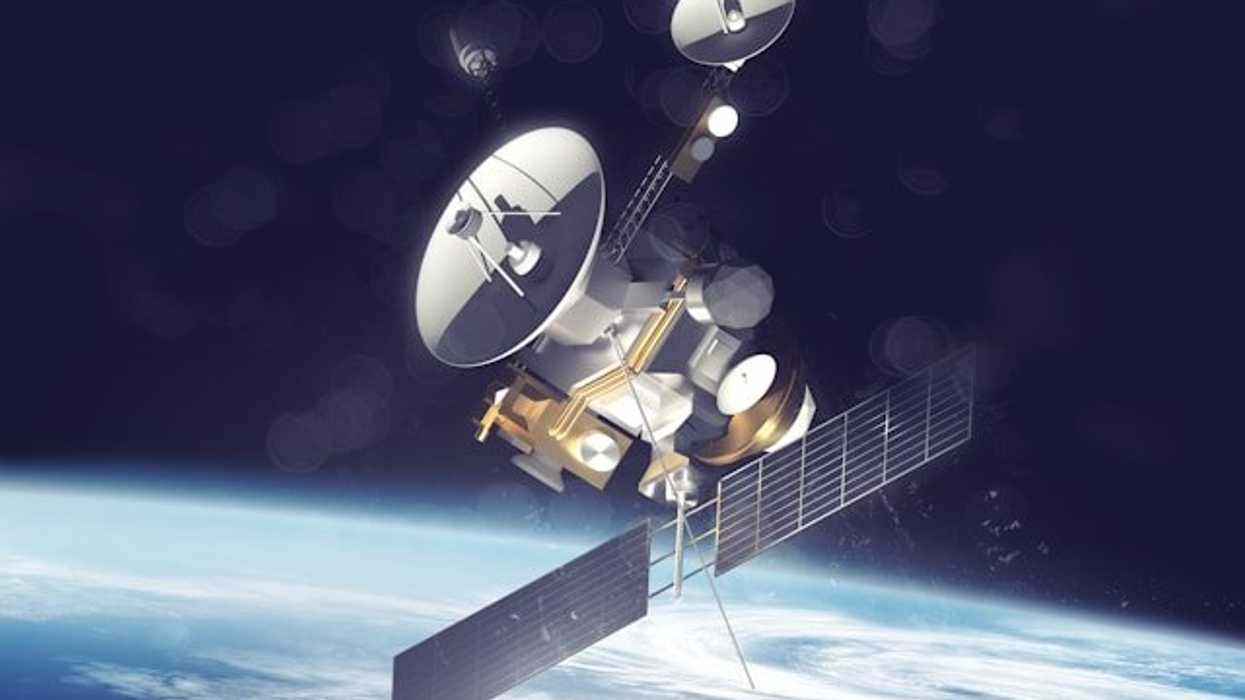 A satellite in space hovering over the earth.