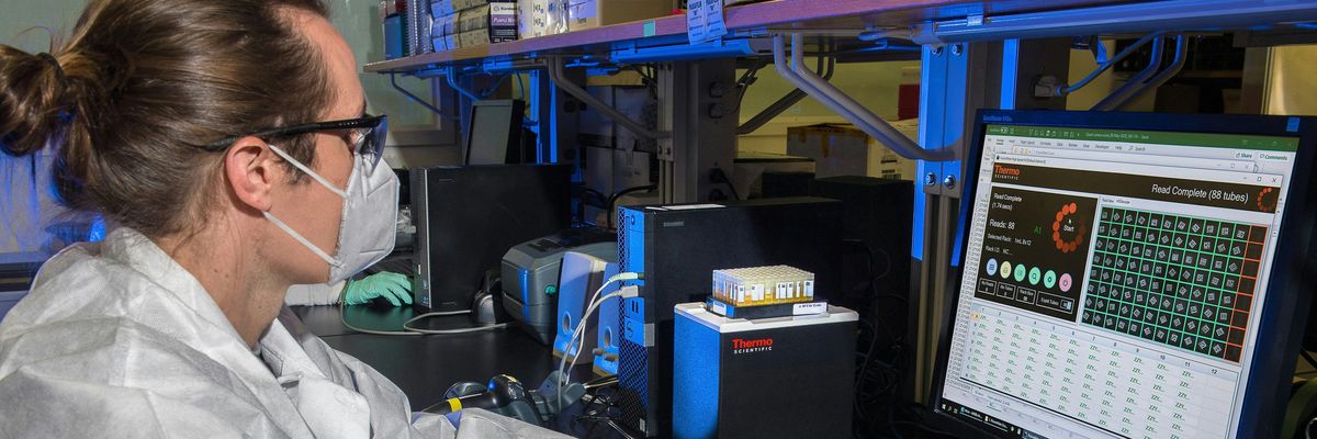 A scientist runs models on a computer